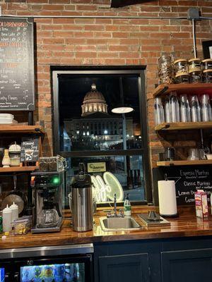 A window with a view of the Capitol