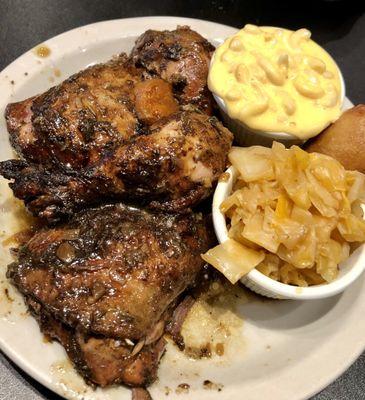 Jerk chicken with macaroni and cheese and the cabbage