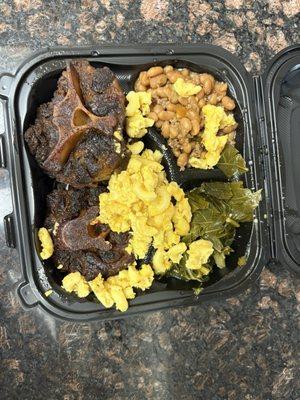 Oxtails, dirty beans, mac n cheese, and greens! Kids picked through before I could take my pic