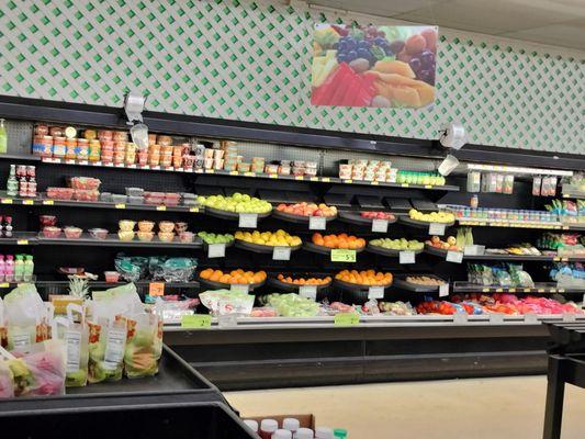 Cold shelves of fresh produce.