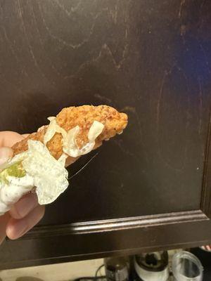 Snack wrap chicken with a nice hair.