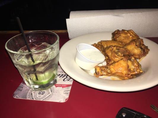 Vodka gimlet and hot and tangy wings