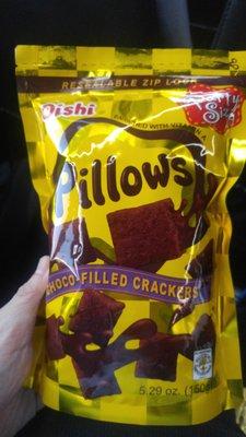 Common packaged snacks sold at the cash register.