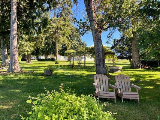 Relax in the Adirondack chairs watching the ships pass by