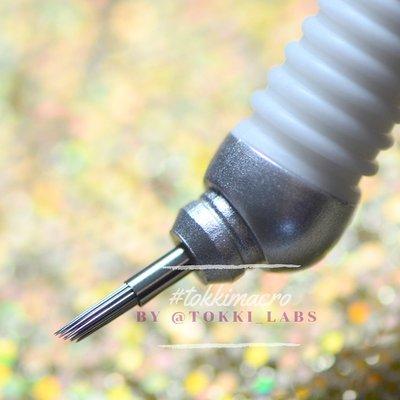 \\ macro photography of a manual hand tool used for microshading