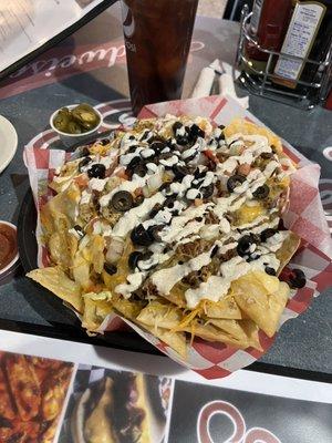 Traditional nachos, with half chicken and half beef (added I think $2 or $3 to the menu price)