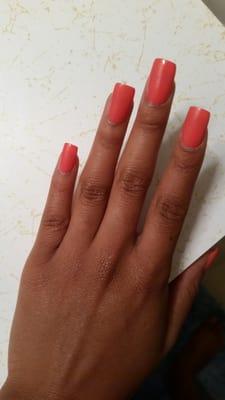 It looks kinda pink in the picture but it's more of a tangerine color