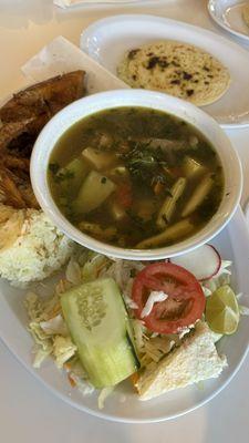 Gallina Frita O En La Sopa. Chicken soup with fried chicken, rice and salad
