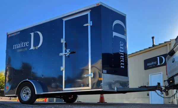 Vinyl cut for Maître D Foods Trailor and building came out great!