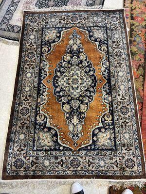 A small silk (cotton) rug