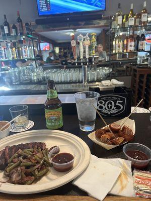 BBQ brisket, "shotgun shell" appetizer and a beer