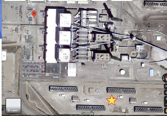 Flat roof coatings with 25 year warranty installed on an electrical power plant