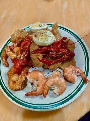 Sushi, crawfish, fried shrimps, and eggs