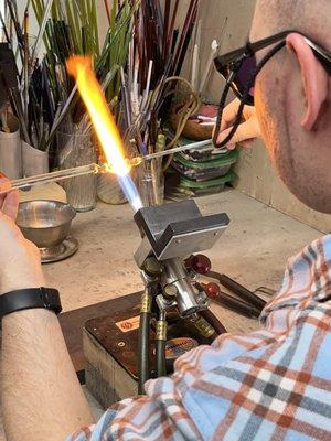 Torch work to melt and begin the shaping or sculpting necessary for each project.