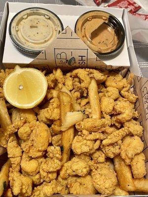 Crawfish tail plate with White BBQ and Cajun Remoulade.