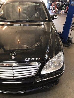 They guys at quality performing preventive maintance on my v12 twin turbo.