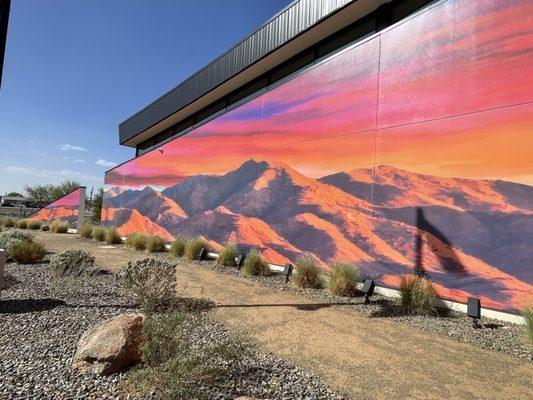 Look for this beautiful mural on the building and you found the library!