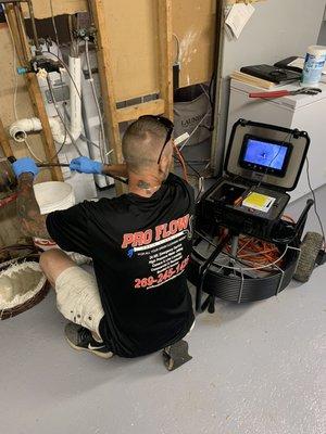 Helping a home buyer see what they can't. Scoping a main drain to ensure no roots or broken pipe exist.