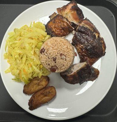 Jerk Chicken, Rice and Peas, Steam Cabbage and Fry Plantains