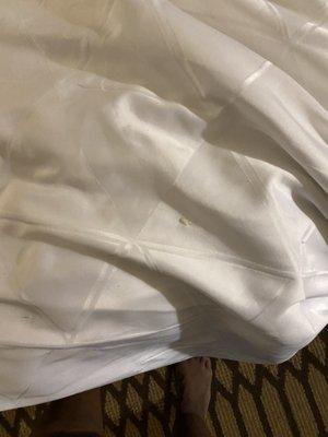 Pull back the sheets then noticed they were wrinkled and stained Who knows what this is??? Yuck