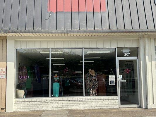 Front of building minus sign (coming soon)