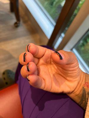 The polish doesn't cover and some acrylic is still under my nail.