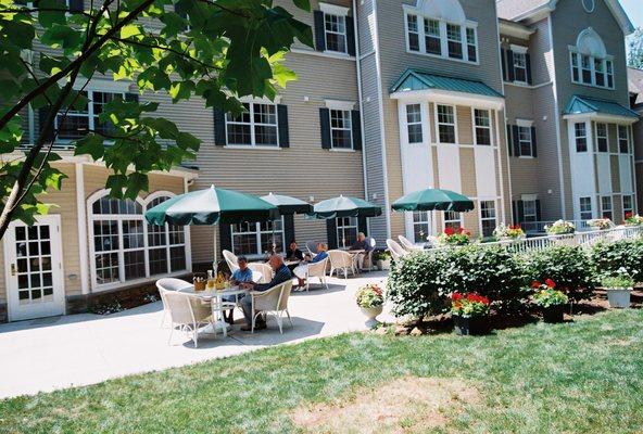 Our residents enjoy our outdoor patio overlooking our beautiful grounds.