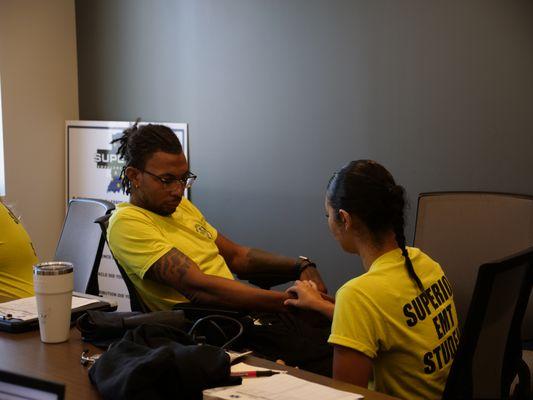 Highland EMT students practicing skills