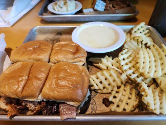 4 sliders, waffle fries and a side of queso