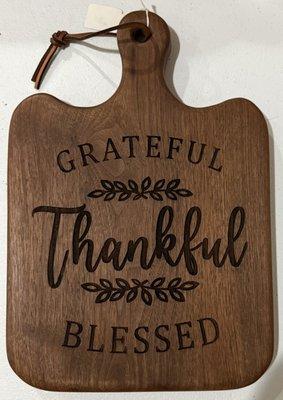 Cutting boards of all shapes and sizes can be engraved with whatever you want on it. Make your gift unique. They'll love it!