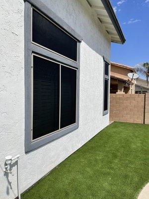 Window Sunscreens. 80% black fabric with Almond frame.