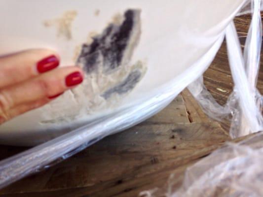 Damage to my clawfoot tub due to ridiculous plastic tape "packaging."