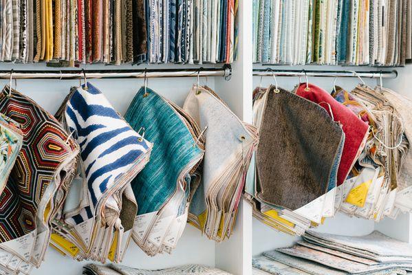 Touch and feel upholstery options from luxury manufacturers with the guidance of our professionals.