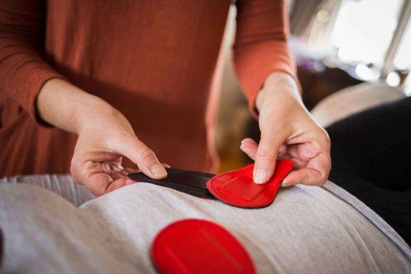 Magnets placed negative and positive pairs on the body.