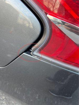 Cracked tail lamp with HUGE gap from the bumper