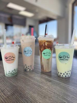 Lychee w/ kiwi popping boba, horchata smoothie w/ boba, brown sugar milk tea, pistachio smoothie with boba