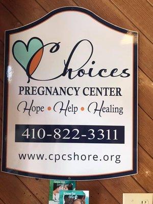The sign in front of our offices says it all. We're here to provide hope, help and healing to those facing an unplanned or crisis pregnancy.