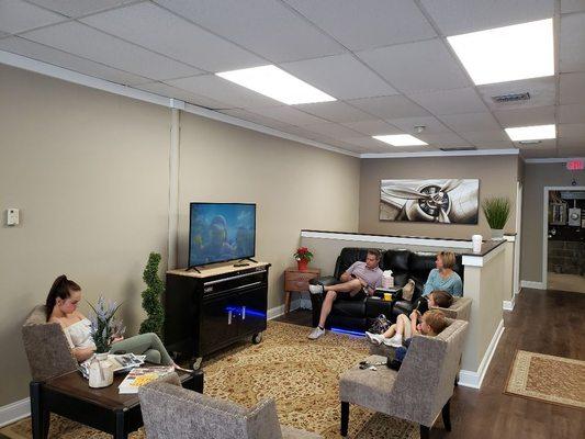 Come enjoy our cozy and welcoming atmosphere while you wait for your haircut!