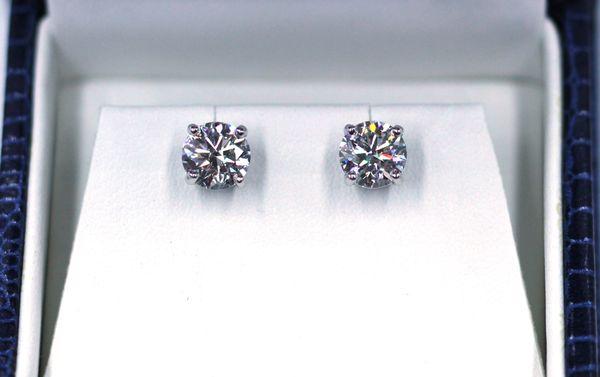 Jeff Deleuse, Graduate Gemologist, hand chooses all diamonds. VS, E-F, set in platinum.