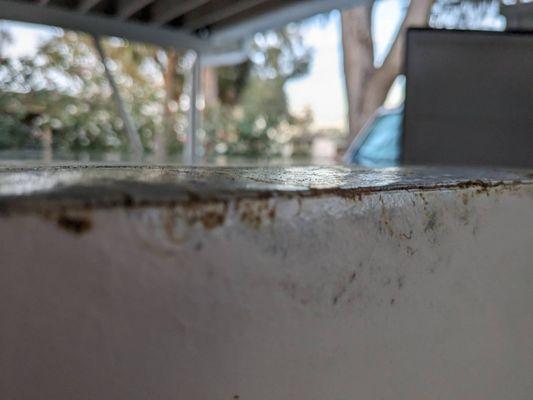 Damaged to top and side as well