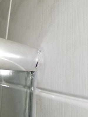 Chrome piece chopped up & tried to seal with clear silicone