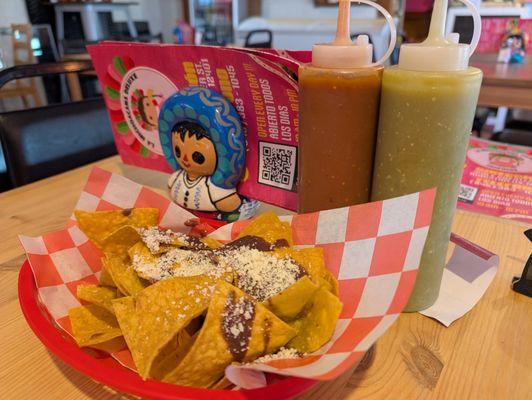 Complimentary chips and sauces