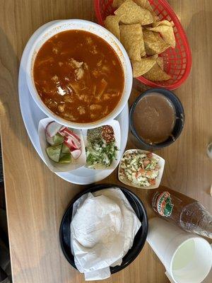 Menudo; chips and bean dip; tamarindo