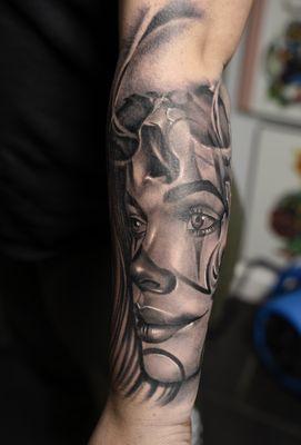 Sad clown girl with skull