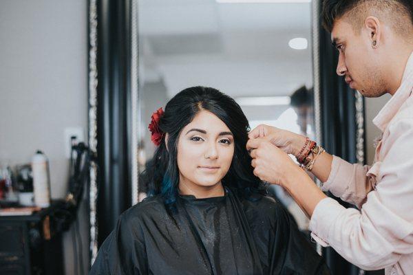 Josh doing my sisters hair the day of our wedding.