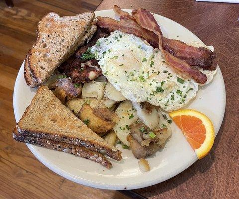Corned Beef Hash w/ Two Eggs, Home Fries, Multigrain Wheat Toast, & Bacon