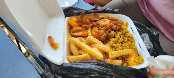 Shrimp meal with rice/beans and fries
