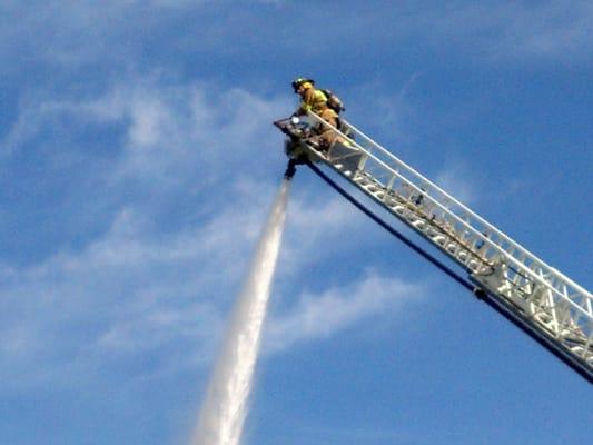 Putting out brush fire by GA-400