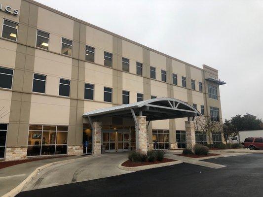 Front of building, office located on second floor