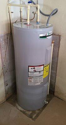 You'd never know a hole was cut in the slab underneath! My heater was beautifully reconnected!